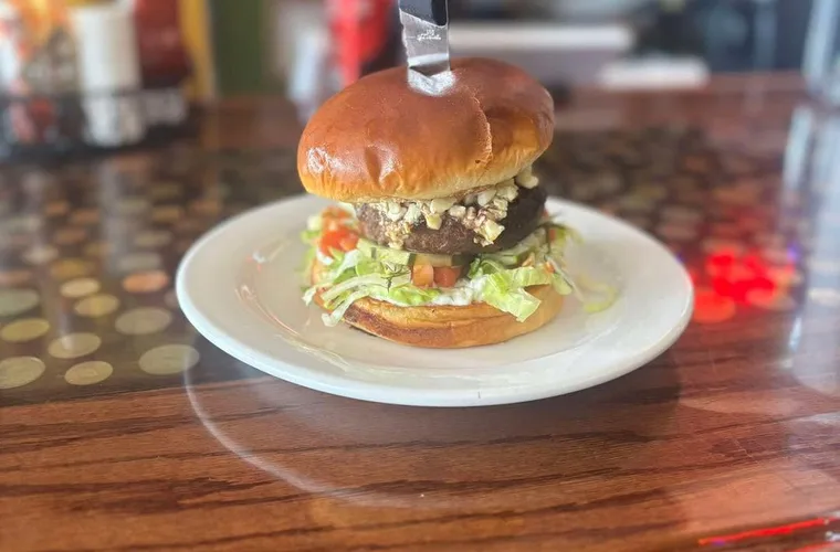 Burger with chips at The Forum Pub